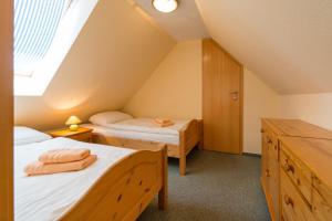 Katil atau katil-katil dalam bilik di Ferienpark Freesenbruch Wohnung 1 6 - Freesenblick +32 gambar