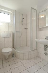 Koupelna v ubytování Residenz am Strand Wohnung 4-59 + 18 fotografií