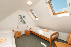 Katil atau katil-katil dalam bilik di Ferienpark Freesenbruch Wohnung 2 5 - Auszeit +31 gambar