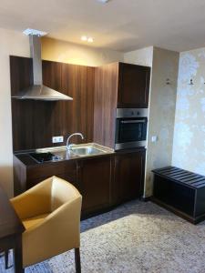 O bucătărie sau chicinetă la Barcelo Royal Beach - Prestige Apartments