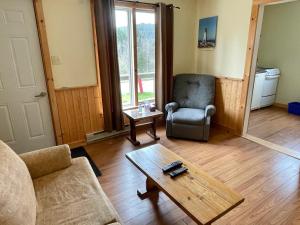 Posezení v ubytování Bonne Bay Cottages