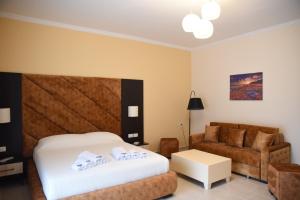 Voodi või voodid majutusasutuse Monte Mare Hotel toas