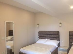Voodi või voodid majutusasutuse Monte Mare Hotel toas