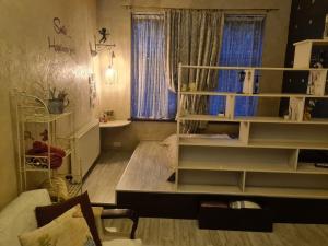 Снимка в галерията на Cozy Compact Flat in the City Center в Лвов