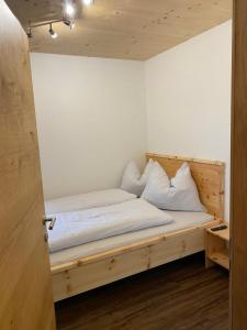 Postel nebo postele na pokoji v ubytování Ferienwohnung Kleinlercher