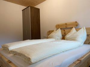 Postel nebo postele na pokoji v ubytování Ferienwohnung Kleinlercher