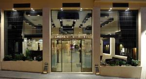 a store front of a shopping mall with a store at Europa Hotel in Kastoria