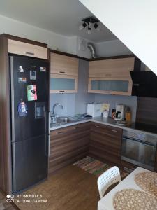 Kuchyň nebo kuchyňský kout v ubytování Apartament w Pucku z widokiem na Morze + 11 fotografií
