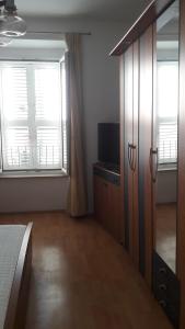 TV a/nebo společenská místnost v ubytování Diadora
