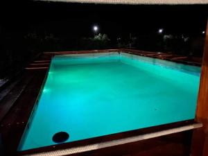 Bazén v ubytovaní Turtle Island Apartments alebo v jeho blízkosti