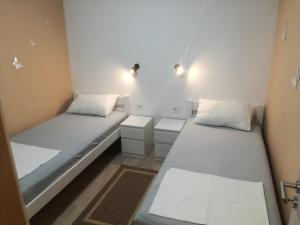 Postel nebo postele na pokoji v ubytování Apartments Borić