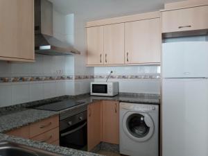 Kuchyňa alebo kuchynka v ubytovaní Apartamento familiar.