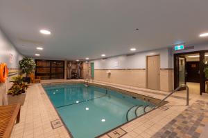 a large swimming pool in a hotel room at Blackcomb Lodge in Whistler