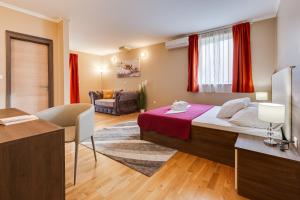 Cama ou camas em um quarto em Hotel Sky