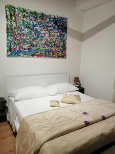 CASTLE VIEW LODGE intero appartamento Verona centro storico tesisinde bir odada yatak veya yataklar