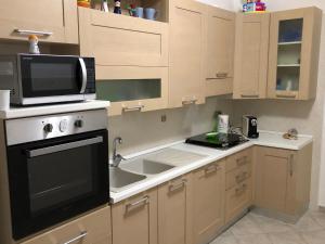 A kitchen or kitchenette at Casa vacanza bella Puglia