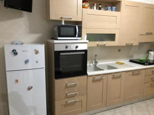 A kitchen or kitchenette at Casa vacanza bella Puglia Még 12 kép