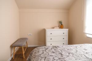 Postel nebo postele na pokoji v ubytování Apartmani MiS