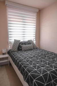 Postel nebo postele na pokoji v ubytování Apartmani MiS