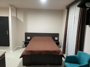Postel nebo postele na pokoji v ubytování Apartmani MiS
