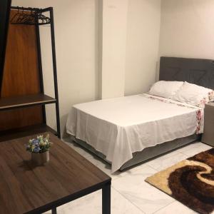 Säng eller sängar i ett rum på Los Monges Aparthotel