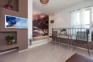 TV a/nebo společenská místnost v ubytování Apartmani Iva