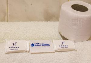 a roll of toilet paper next to a roll of toilet paper at Hostal Casa Del Inka in Cusco