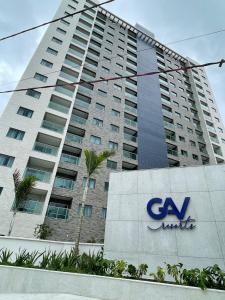 a sign in front of a large building at SALINAS EXCLUSIVE RESORT in Salinópolis