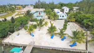 an aerial view of a beach with playground equipment at Hidden Treasure Vacation Home BayBlue Suite 1 in Belize City