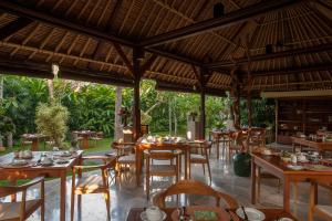 Restaurant ou autre lieu de restauration dans l'établissement Komaneka at Monkey Forest Ubud