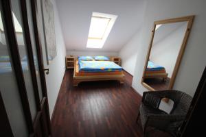 Postel nebo postele na pokoji v ubytování Luxury Apartment in Sumava Mountains