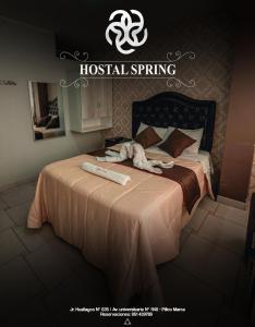a poster of a bed in a room at Hostal Spring II in Huánuco