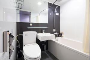 Kylpyhuone majoituspaikassa HOTEL MYSTAYS Oita