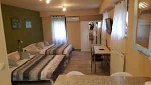 Posteľ alebo postele v izbe v ubytovaní Guest House Wolf