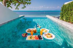 The swimming pool at or close to White Whale Beachfront Pool Villa