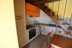 Kuchyň nebo kuchyňský kout v ubytování Casa Patrizia