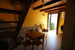 Posezení v ubytování Casa Patrizia + 2 fotografie