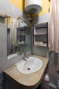 Kylpyhuone majoituspaikassa Karibu BB Suites