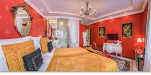Posteľ alebo postele v izbe v ubytovaní B&P Maine Street Apartments