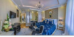 Posteľ alebo postele v izbe v ubytovaní B&P Maine Street Apartments