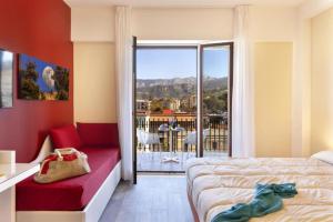 Posteľ alebo postele v izbe v ubytovaní Parco Tasso Guest House