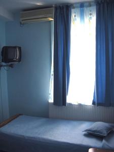 Cama o camas de una habitación en Hostel Sport