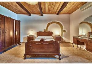 Postel nebo postele na pokoji v ubytování Achilleas Apartments with Sea View + 37 fotografií