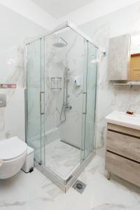 Koupelna v ubytování (Apt.4) Lofos Apartments in Vergia Halkidiki + 15 fotografií
