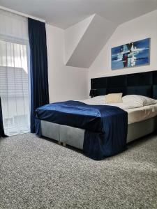Кровать или кровати в номере Villa Fala