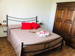 Posteľ alebo postele v izbe v ubytovaní Agriturismo LA VECCHIA CASCINA
