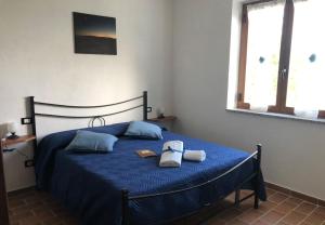 Posteľ alebo postele v izbe v ubytovaní Agriturismo LA VECCHIA CASCINA