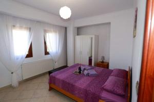 Posteľ alebo postele v izbe v ubytovaní Martha Apartment
