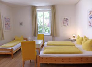 Postel nebo postele na pokoji v ubytování Pension Stoi budget guesthouse