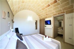 A television and/or entertainment centre at Villa Stella
